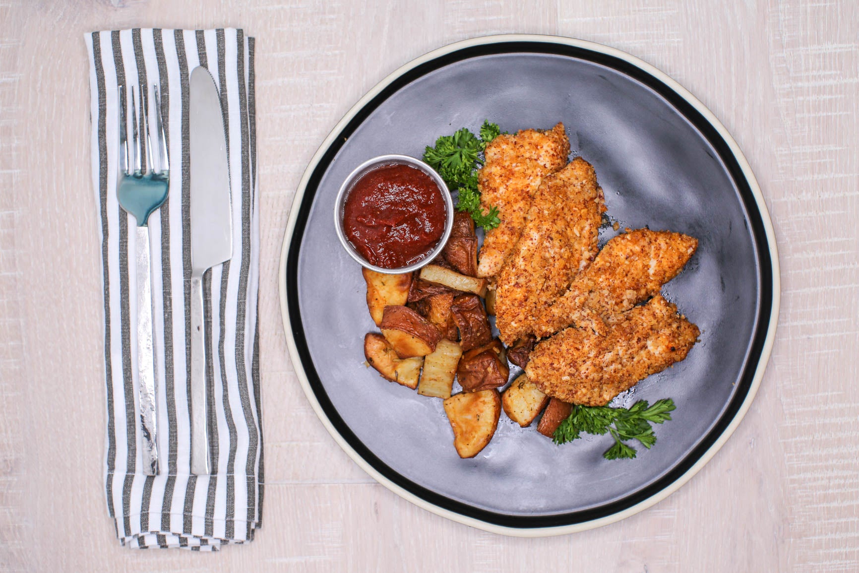 Almond Crusted Chicken Strips + Roasted Potatoes + BBQ Sauce
