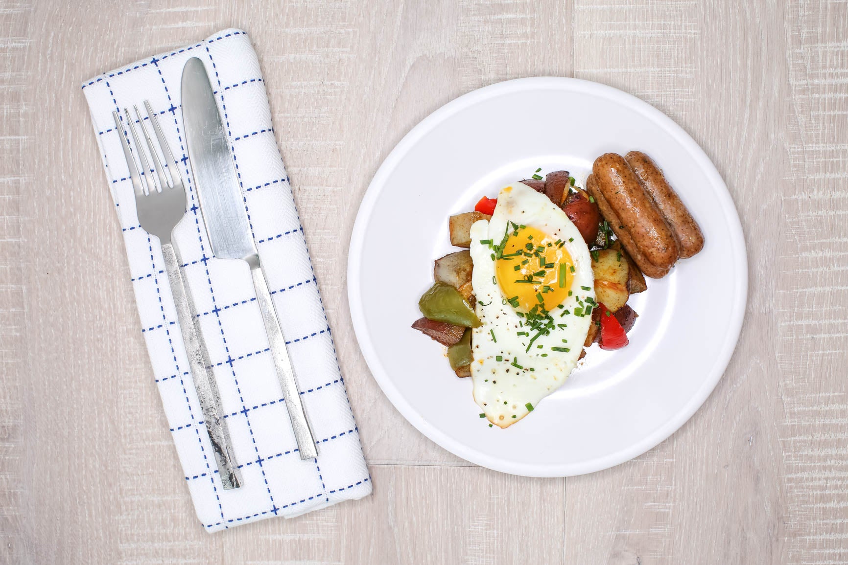 Organic Maple Chicken Sausage with Potato Hash + Fried Egg